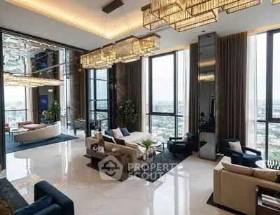 Luxurious high-rise living room with panoramic city views and elegant decor.