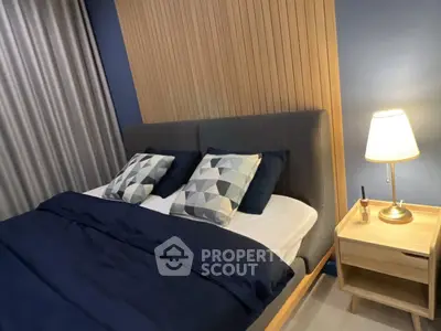 Modern bedroom with stylish decor and cozy lighting