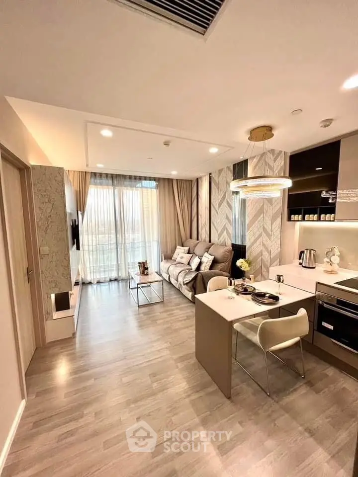 Modern open-plan living room with stylish decor and natural light