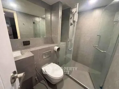 Modern bathroom with sleek design and glass shower enclosure