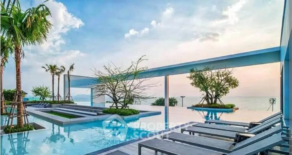 Luxurious rooftop pool with stunning ocean view and modern design.