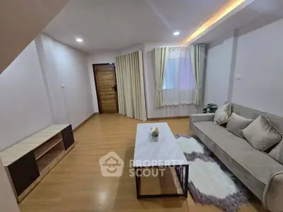 Modern living room with cozy sofa and stylish coffee table