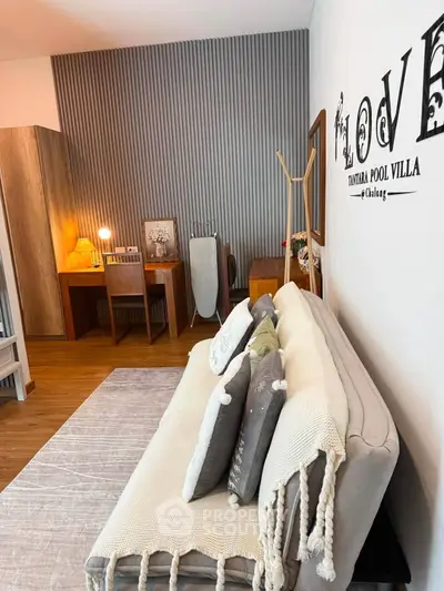 Cozy living room with stylish decor and comfortable seating in a modern villa.