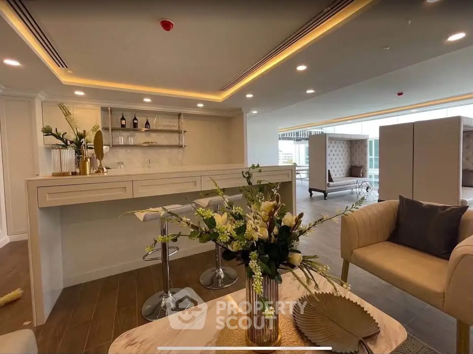 Luxurious modern living room with elegant decor and open layout, featuring stylish furniture and ambient lighting.