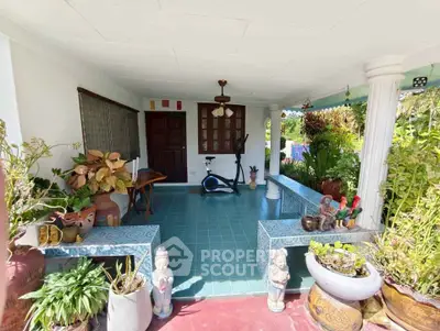Charming garden entrance with exercise bike and decorative plants