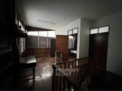 Spacious wooden interior with natural light and cozy atmosphere