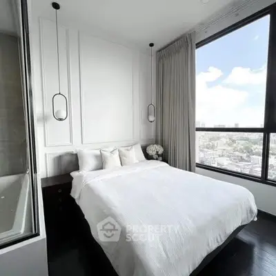 Luxurious bedroom with stunning city view and elegant decor