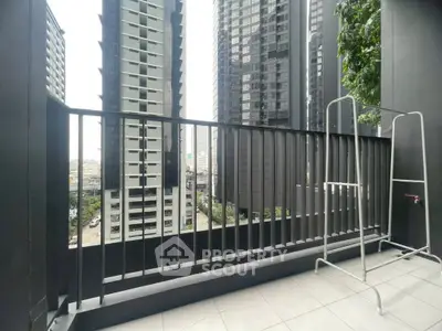 Modern balcony with cityscape view in high-rise apartment