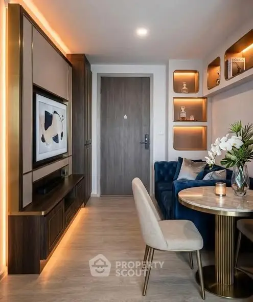 Modern living room with elegant decor, stylish furniture, and ambient lighting.