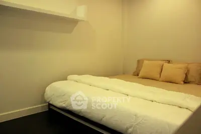 Cozy minimalist bedroom with warm lighting and modern decor