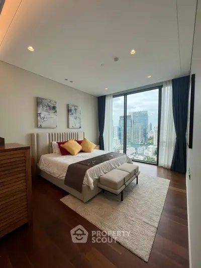 Luxurious bedroom with stunning city view and elegant decor