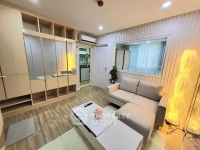 Modern living room with cozy sofa and stylish decor