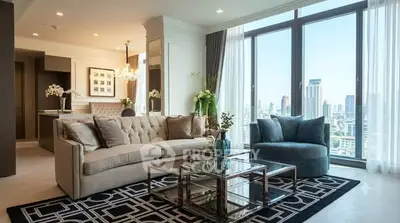 Luxurious living room with stunning city view, elegant furniture, and modern decor in high-rise apartment.