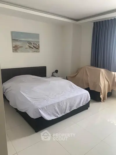 Cozy bedroom with modern decor and natural light