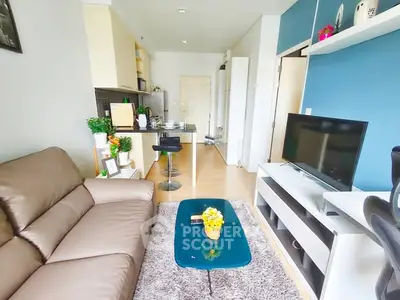 Modern living room with stylish decor and open kitchen layout