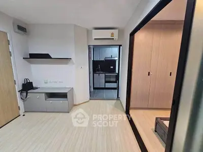 Modern apartment interior with open layout and sleek kitchen design