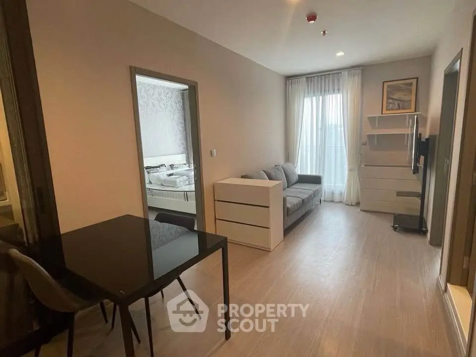 Modern living room with sleek furniture and natural light