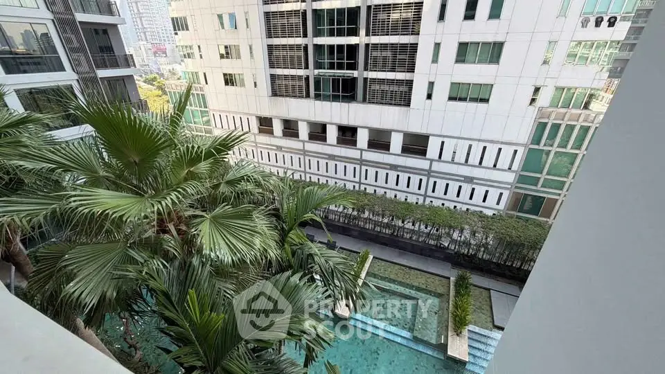 Luxurious urban apartment view with lush greenery and modern architecture