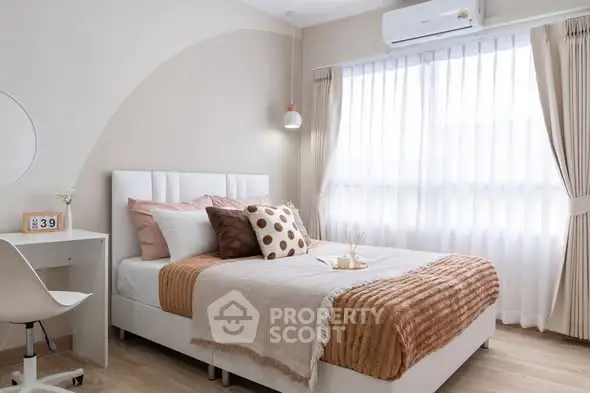 Cozy and stylish bedroom with modern decor and natural light