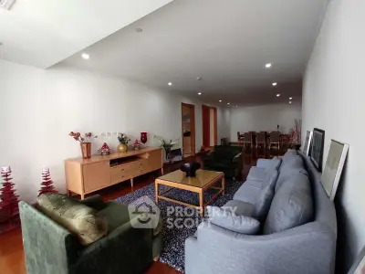 Spacious living room with modern furniture and elegant decor