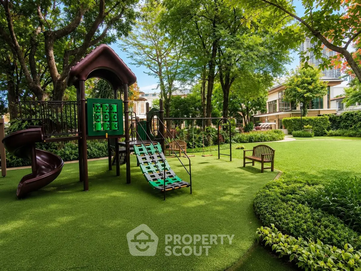 Lush green garden with playground in upscale residential community