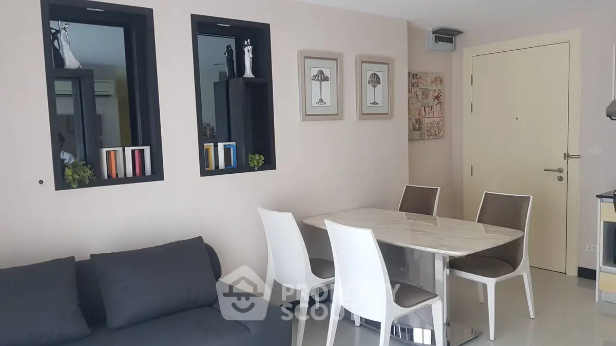 Modern living room with stylish dining area and contemporary decor