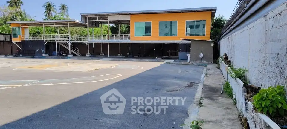 Spacious commercial property with ample parking and modern design, ideal for business expansion.