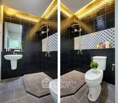 Modern bathroom with stylish black tiles and elegant lighting