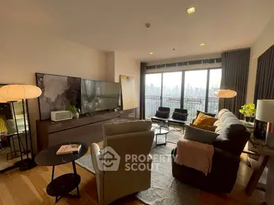 Spacious living room with modern decor and city view balcony