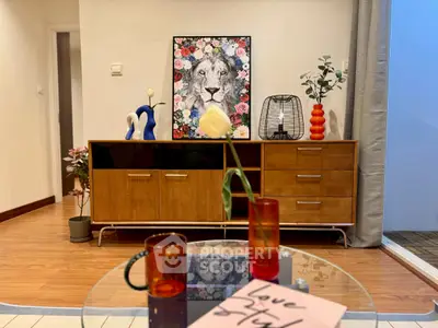 Stylish living room with modern decor and vibrant artwork