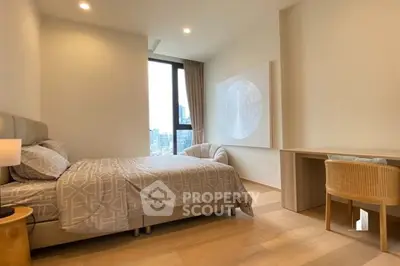 Modern bedroom with city view, cozy bed, and stylish decor