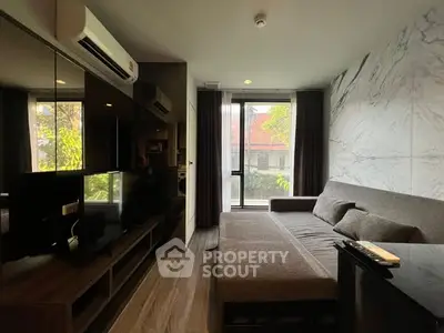 Modern living room with sleek design and natural light