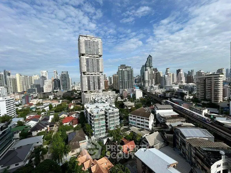 Stunning cityscape view showcasing modern skyscrapers and urban landscape under a clear blue sky.