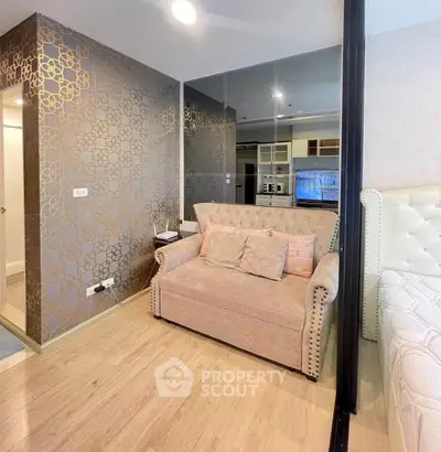 Stylish modern living room with elegant wallpaper and cozy seating area