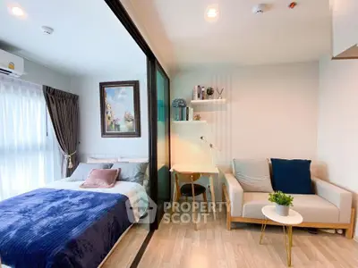 Modern studio apartment with cozy bedroom and stylish living area