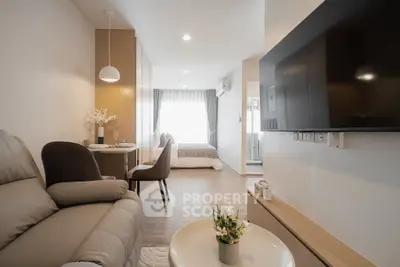 Modern open-plan living room with cozy seating and stylish decor