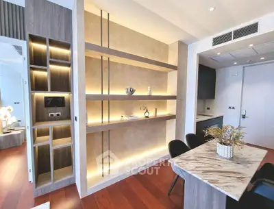 Modern interior with stylish shelving and elegant dining area in contemporary apartment.