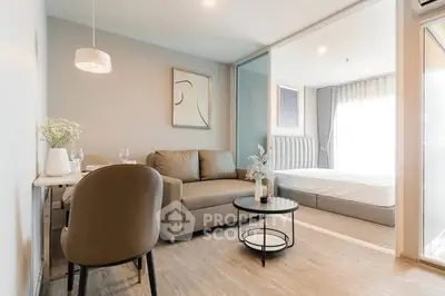 Modern open-plan living room with cozy seating and elegant decor