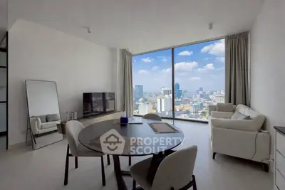 Modern living room with stunning city view, featuring sleek furniture and floor-to-ceiling windows.