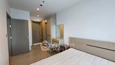 Modern bedroom with minimalist design and ample natural light
