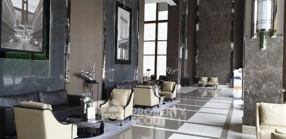 Luxurious building lobby with elegant seating and modern decor