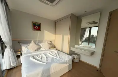 Cozy bedroom with elegant decor and scenic window view