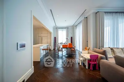 Spacious living room with elegant dining area and modern decor