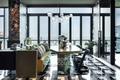 Luxurious modern living room with panoramic city view and stylish decor.