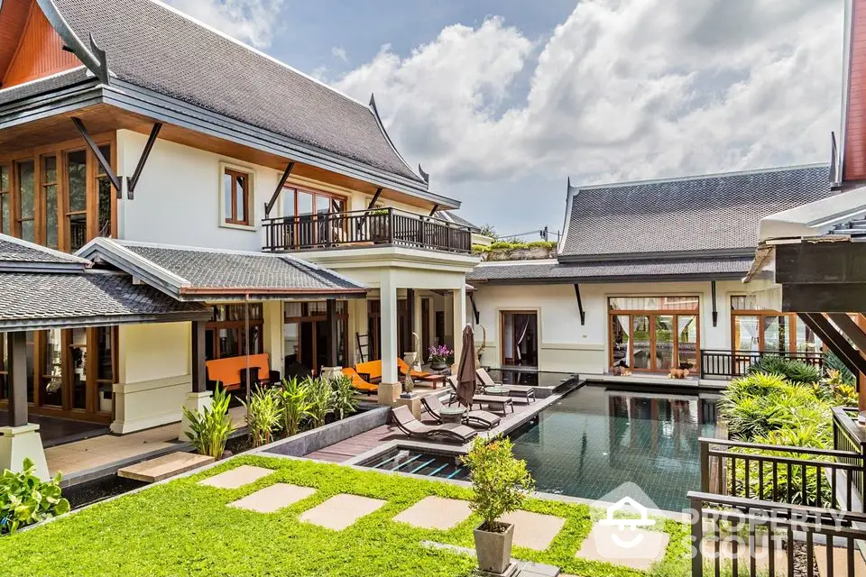 Luxurious tropical villa with private pool and lush garden, perfect for serene living.