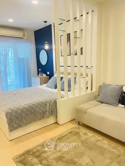 Modern bedroom with stylish decor and cozy ambiance, featuring a comfortable bed and elegant furnishings.