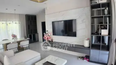 Luxurious modern living room with elegant marble TV wall and stylish decor