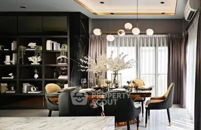 Luxurious dining room with elegant decor and modern lighting in a stylish apartment.