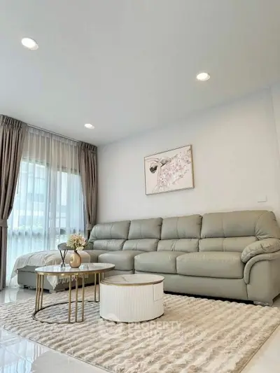 Elegant living room with plush sofa and modern decor