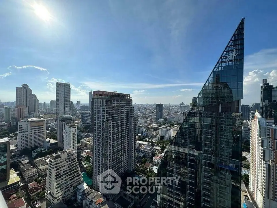 Stunning cityscape view from a high-rise building showcasing modern architecture and skyline.